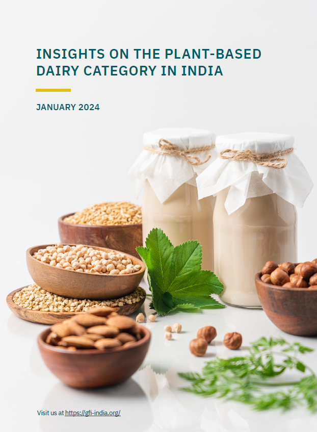 Jars of plant milk and bowls of nuts